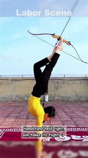 “Impossible” archery: feet + handstand = bullseye 🚀