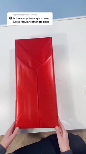 Reply to @lizobriien this is a super easy way to wrap a normal box and make it look unique #tiktokholidays #wrappinggifts #giftwrapping #howtowrap