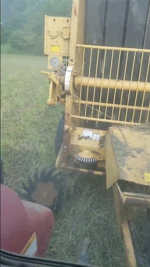 baling hay 85c international pulling vermeer 605j baler