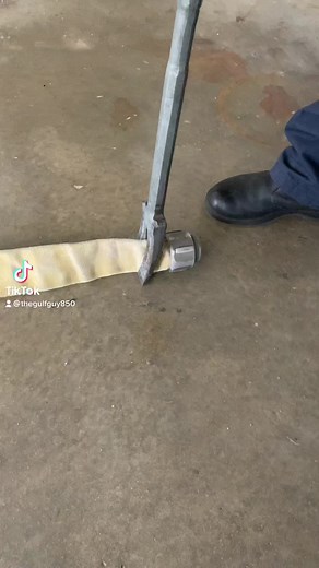 Different way to roll fire hose using a halligan #firefighter #functionalfireground