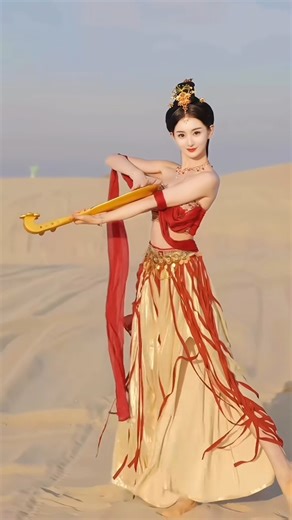 In the vast expanse of the desert, a woman gracefully performs the ancient dance of Dunhuang.With every gesture, she tells a story of a land rich in history and tradition. The swirling robes and delicate footwork create a breathtaking visual spectacle against the backdrop of the arid desert. 🎥:douyin-中国舞💗莹莹 #dunhuang #dance #desert #history #amazing | Fantastic China