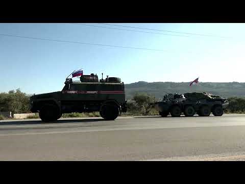 Russian military base in Syria bustling as forces pull back | REUTERS