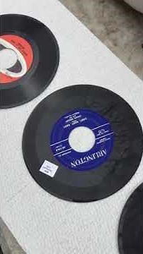 How to safely remove price stickers from the playing surface of vinyl records.