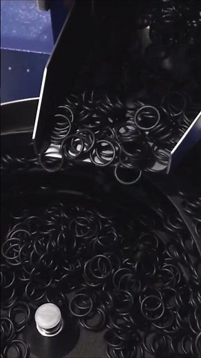 Up close and personal with this hopper + vibratory bowl feeder system