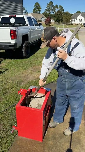 Filling a ballast box up with concrete for the new tractor