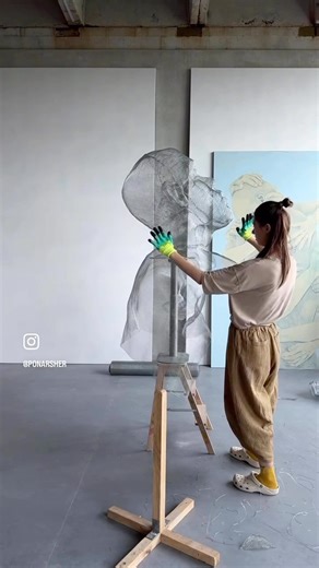 Sculpture Day | This artist, known as Pona Rsher, creates suspended human figures using wire mesh, blending sculpture with spatial installation. Her... | Instagram