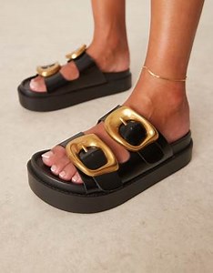 ASOS DESIGN Wide Fit Femi oversized buckle footbed mules in black | ASOS