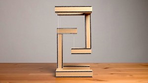 A Simple Yet Ingenious Cardboard Sculpture That Provides the Illusion of Floating Structural Compression
