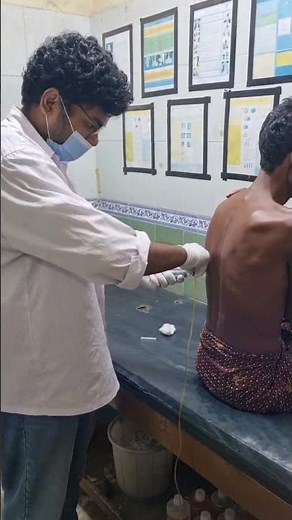 Pleural tap being done in a patient of pleural effusion