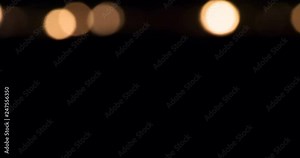 Candlefire Resurrection from the Darkness. Field burning candles close-up. Candles begin to light up in the distance and the lights gradually approach the chamber. Filmed at a speed of 120fps