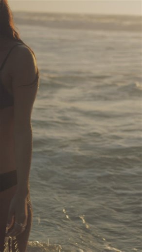 Woman's portrait wearing a bikini at the beach - Free Stock Video