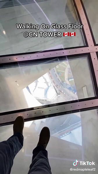 Walking On Glass Floor at CN Tower Toronto