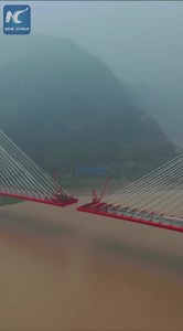 This cable-stayed bridge across the Yellow River is near completion in western China. Watch how it was constructed | China Xinhua News