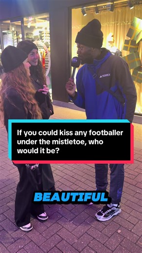 Kissing Football Stars Under the Mistletoe in London