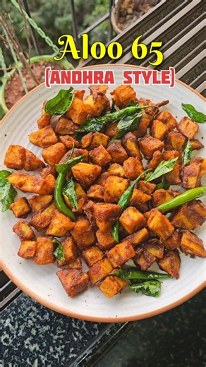 Prerna Wavare | Desi & Fusion Recipes 🍳 on Instagram: "⭐ Andhra Style Aloo 65 Recipe (Crispy & Spicy) For Aloo 65: Potatoes – 4 (big size, boiled & cubed) Turmeric powder – ¼ tsp Red chilli powder – 1–1.5 tsp Chicken 65 masala – 4–5 tsp Peri peri masala – ½–1 tsp Cumin powder – ½ tsp Black pepper powder – ¼ tsp Chaat masala – ½ tsp Corn flour – 3 tsp Salt – as per taste For Tadka/Garnish: Green chillies Curry leaves [ Andhra style Aloo 65, Aloo 65 recipe, South Indian potato starters, Crispy po