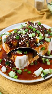 This silken tofu recipe with spicy soy sauce is an easy show-stopping vegetarian meal that's loaded with flavor. Ready in just 5 minutes! | Live Eat Learn