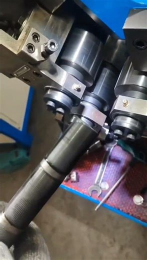 Three-axis precision thread rolling machine.