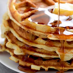 Homemade waffles with bisquick are a great way to start the day. Top them with butter and syrup or fresh fruit and whipped cream. Printable Recipe Card ➡️ https://www.thegunnysack.com/waffles-with-bisquick/ | The Gunny Sack