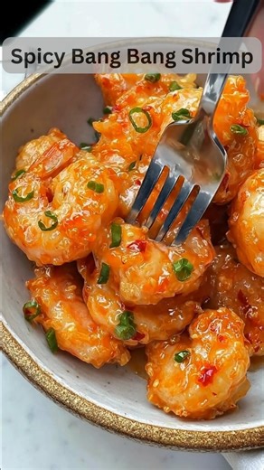 Spicy Bang Bang Shrimp — Crispy, Creamy, Addictively Spicy! If you love bold flavor and super crispy shrimp coated in a sweet-spicy creamy sauce, this Bang Bang Shrimp will be your new favorite appetizer! Ingredients For the Shrimp: 1 lb large shrimp, peeled & deveined 1 cup cornstarch (or flour) 1 egg, beaten Salt & pepper to taste Oil for frying For the Bang Bang Sauce: ½ cup mayonnaise ¼ cup sweet chili sauce 1–2 tbsp sriracha (adjust to spice level) 1 tbsp honey (optional for sweetness) 1 ts