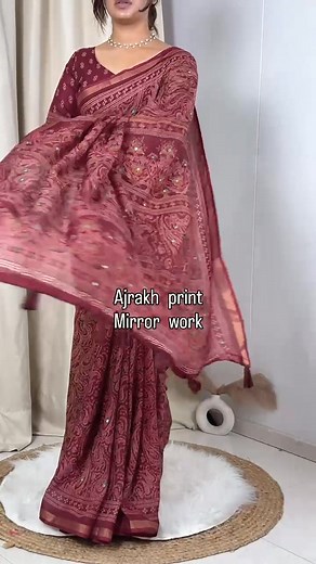*DESIGN-Kalamkari* *Effortless elegance meets vibrant charm with this Designer ajrakh printed beauty* *Fabric-* *Saree-pure mul cotton* *SIZE-* *Saree-6.30 mtr with running blouse* *Pattern-* *1- morror work in full saree* *2-Ajrakh Printed saree with zari jacquard border* *3- Tussles in pallu* | Clorea Hub | Facebook