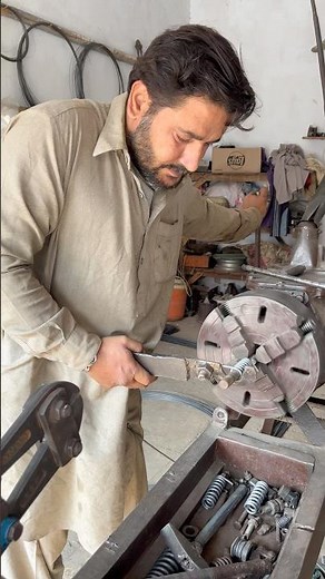 Professional worker makes spring with accuracy #shortvideo #youtube