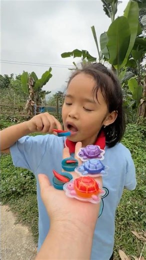 The kind little girl ate rainbow candy and drank cocacola very well. #funny #candy #food #cute