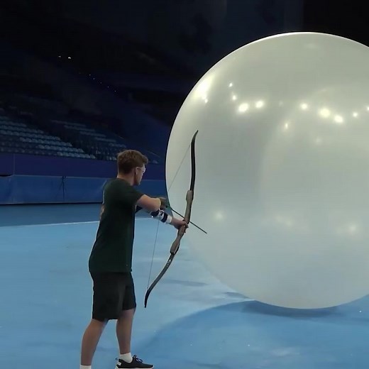POPPING 10 Giant Balloons With A Bow & Arrow! #reels #fun #challenge #funny | How Ridiculous