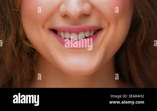Portrait of Young Happy Woman Smiling Carefree on Camera Close Up. Inspiration to Gorgeous Skincare for Glowing Face and Nice Perfect Teeth for Female Person. Good Emotional Mood of Single Adult Girl Stock Video Footage - Alamy