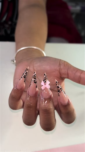 Cheetah stiletto w/bow 🎀 • February books are open now click instagram button in bio to book with me today 💕 #fyp #phillynails #nailspa #stilettonails #cheetahprint #cheetahgirls #cheetahnails #cheetahnailart #bowcharms #nailscharms #nailswag #nailsartvideos