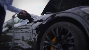 Charging an Electric Vehicle at a Contemporary and Fully Equipped Charging Station Facility