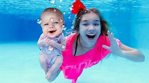598K views · 8.7K reactions | Maggie swimming with little Naomi 藍藍 | Baby baby cartoon | Facebook