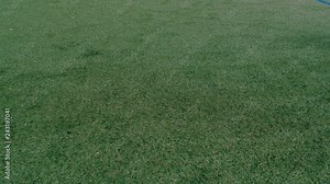 Footballer soccer player making tricks on the field, 4k slow motion