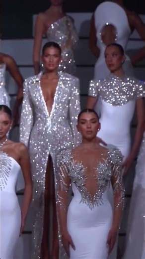 To order this white dress DM A sculpted halter mermaid gown crafted in fluid satin, designed to