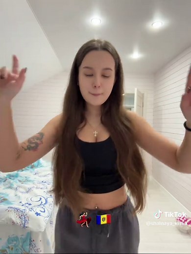 Moldovan Woman Dancing in Bedroom