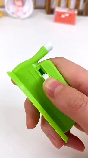Needle threader. Can thread two needles a second, even with your eyes closed.