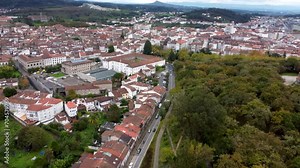 Beautiful Santiago de Compostela City. Green landscape, houses on hills. Architecture typically for north of Spain. View of surroundings of Santiago de Compostela city. Drone going forward