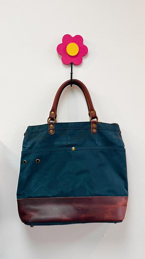 17 reactions · 3 comments | The perfect project doesn’t exist… OH WAIT it does! Della Q has some incredible waxed canvas project bags like this tote bag! They are great for taking your projects on the go and stuffing them full of yarn. My favorite features about Della Q bags is that they also include a yarn threader and yarn cutter attached to the bag! #moonandyarn #yarnshop #dellaq | Moon & Yarn Craft Room | Facebook