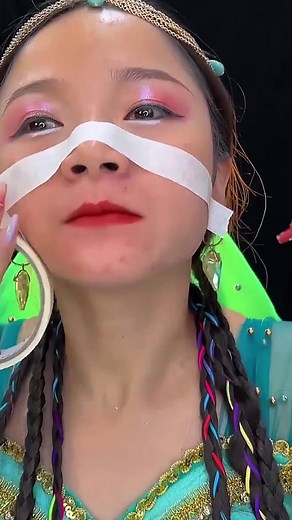 Elegant Makeup Tutorial Featuring Colorful Products