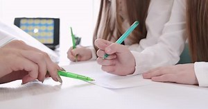 Children Learning and Studying at the Table
