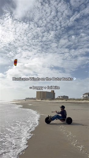 Hurricane winds on the Outer Banks? Of course we had to break out the beach buggy and foil kite with our friends at @hqkites 😮 Would you try this? Let us know in the comments! | Kitty Hawk Kites