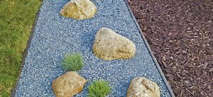 Wood Chip vs. Gravel Landscaping | DoItYourself.com