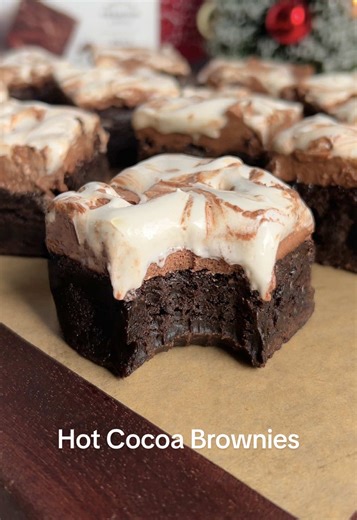 Gluten Free Hot Cocoa Brownies! Incredibly rich and fudgey brownies, thanks to Americas #1 gluten free brownie mix from @King Arthur Baking , with a homemade whipped hot chocolate frosting, and swirls of marshmallow fluff throughout! These brownies are sure to be a hit at your holiday parties, whether your guests are gluten free or not! You'll need 1 box King Arthur's Gluten Free Brownie Mix 1/2 cup butter, melted 2 eggs 2 tbsp water Hot Cocoa Frosting 3/4 cup heavy cream 1/4 cup powdered monkfr