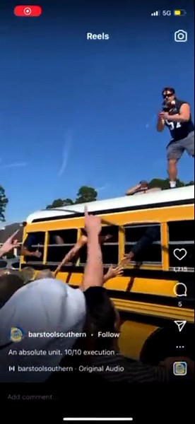 Georgia Southern's Gavin Adcock atop school bus