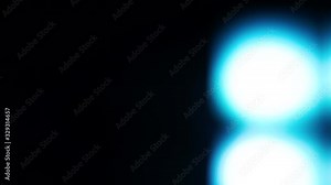 Background made from the movement of light bulbs on a black background in bokeh effect. Concept video effects.