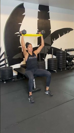 Seated Dumbbell Press with Mini Band | Add some external rotation to increase shoulder stability