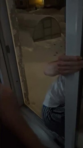 Man Leaps From Window Into Deep Snowdrift