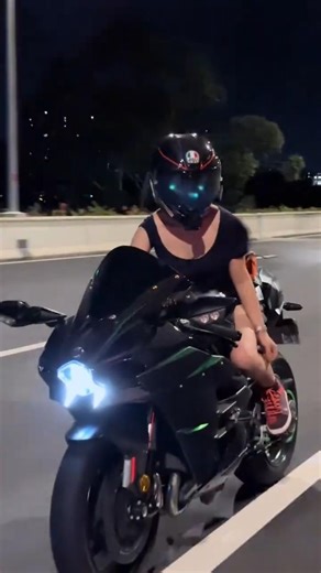 Girl Riding a Kawasaki H2c