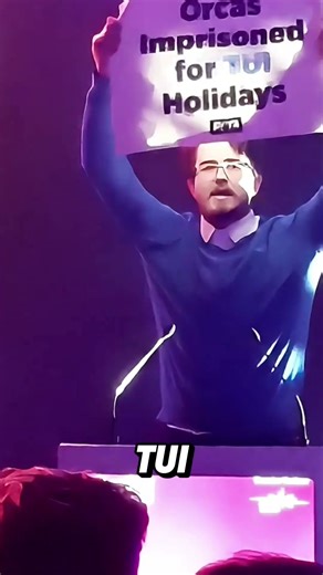 BREAKING, a PETA supporter just disrupted a TUI panel to expose the company’s role in orca suffering