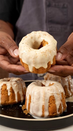 120K views · 219 reactions | Mini Pumpkin Bundt Cakes with Cream Cheese Glaze—an easy fall treat by @brandongouveia made from box cake mix but with a few hacks to give it a homemade feel! Chef Brandon Gouveia Full recipe linked here! https://tasty.co/recipe/mini-pumpkin-bundt-cakes | Tasty | Facebook