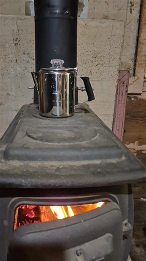 I got cold this evening. Figured I'd warm the whole house up with a little wood heater action. Coffee too | James Walker